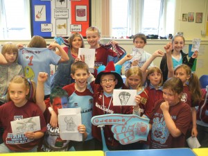 Pupils from St John Cliviger Primary School help Burnley press home their advantage.